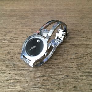 Movado, women's black dial watch with original box