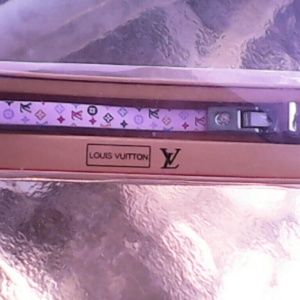 new in box louis Vuitton cell phone charm