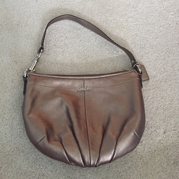 Metallic coach wristlet