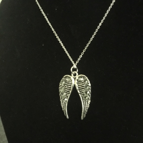 Angels Swarovski Necklace 20 inch chain.