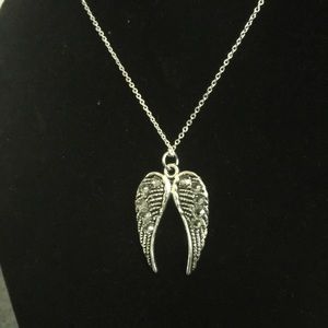 Angels Swarovski Necklace 20 inch chain.