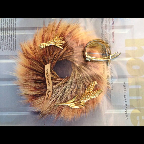 3 Gold tone harvest brooches.