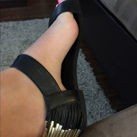 Black and gold strappy sandals