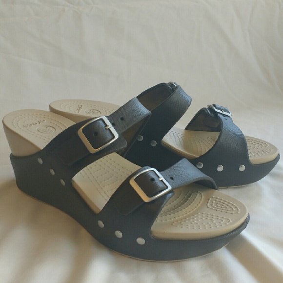 Taupe colored crocs.