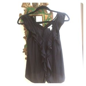 Flirty silk sleeveless blouse