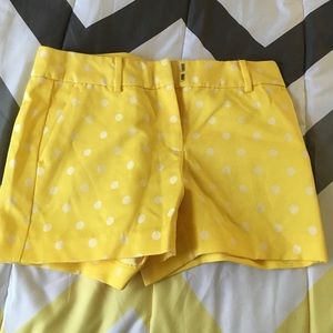 Yellow shorts with white polka dots