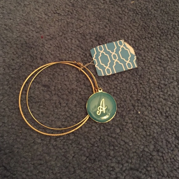 Gold necklace with A charm