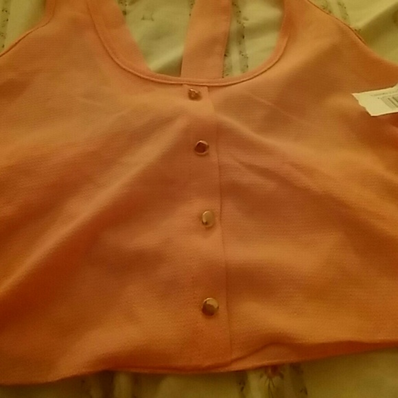 Brand new dress up or down tank top.