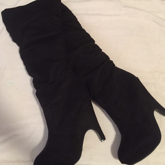 Knee high black suede boots