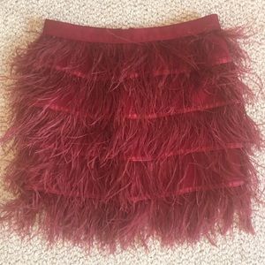 Red feathered mini skirt