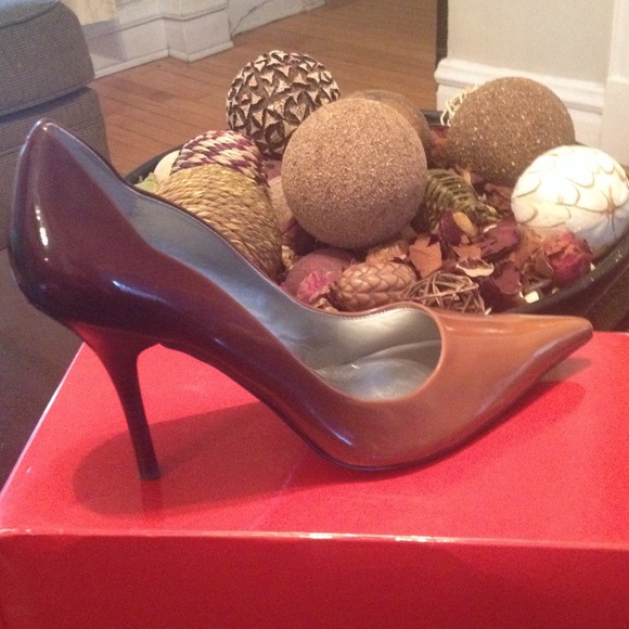 Brown and Tan Patent Leather Pump by Guess.