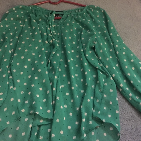 Teal three quarter length sleeve blouse.