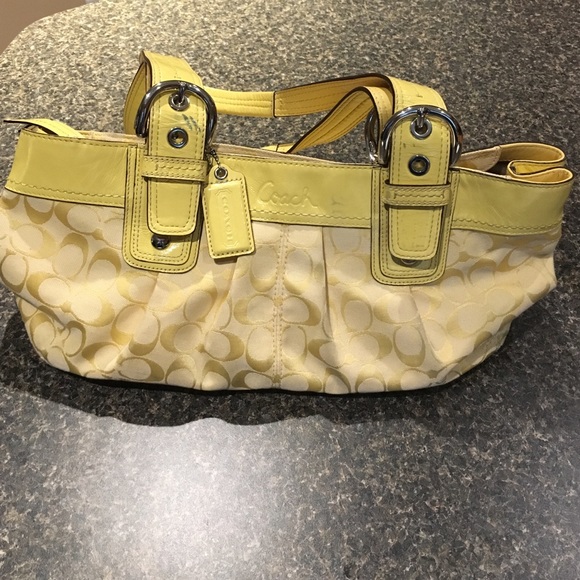 Used yellow Coach shoulder bag!