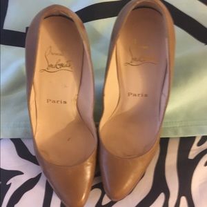 Christian Louboutin heels.