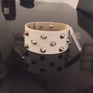 White leather and gold studded bracelet
