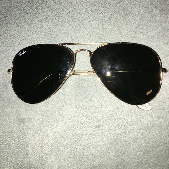 Gold rimmed Ray-Ban aviators