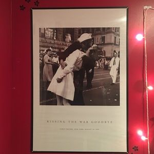 Framed kissing the war goodbye poster
