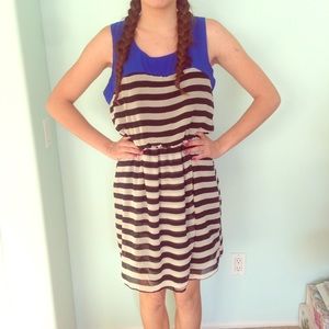 Black and beige striped dress w/ blue accent top.