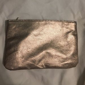 Gold textured makeup bag