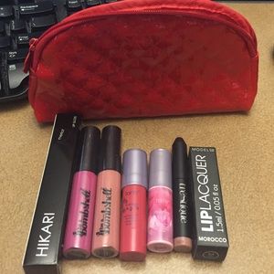 Brand new! Lot of lip products! With cute red bag!