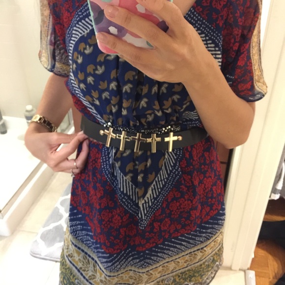 Stylish black belt with gold cross detail