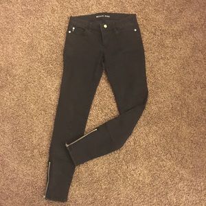 Michael Kors jeans in Black with zipper legs.