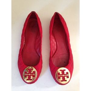 Tory Burch quilted ruby red and gold flats.