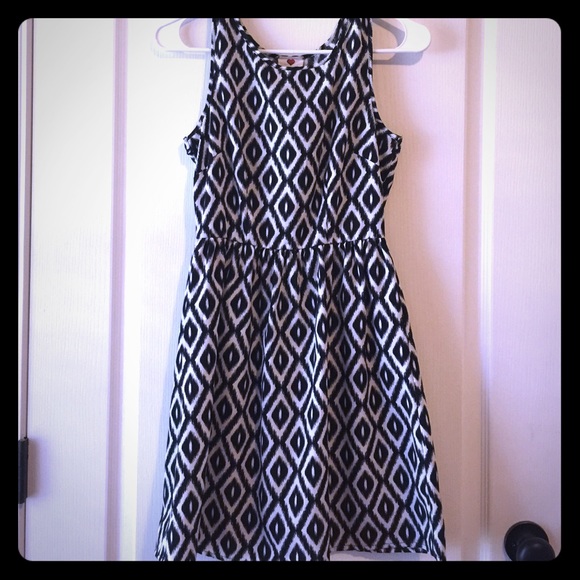 Super cute backless dress.