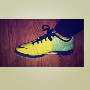 Neon green turf soccer shoes