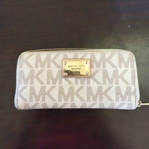 Jet Set Continental travel wallet by Michael Kors