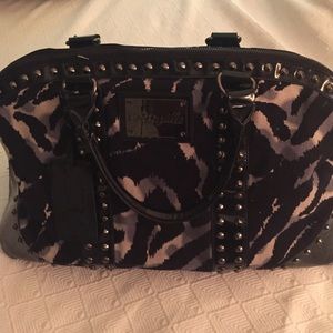 Betsey Johnson travel bag.