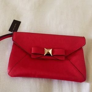 The Limited Leather Bow Wristlet