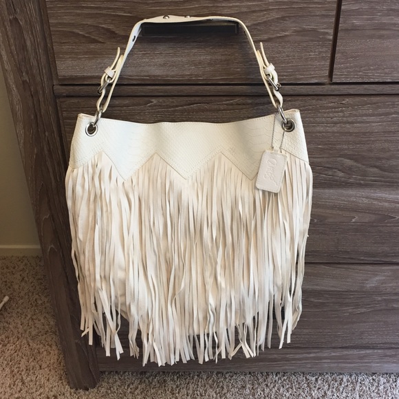 Carlos Santana Handbags - Cute white Carlos Santana Bag