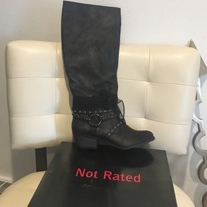 Black embellished cowboy boots.