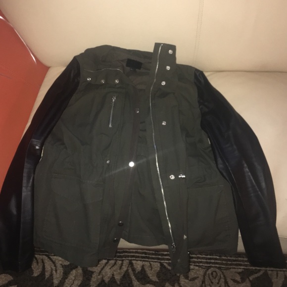 Black and olive green jacket with leather sleeve