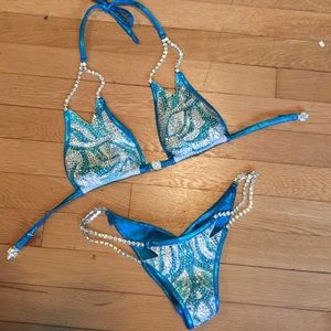 Teal Tiger eye posing bikini