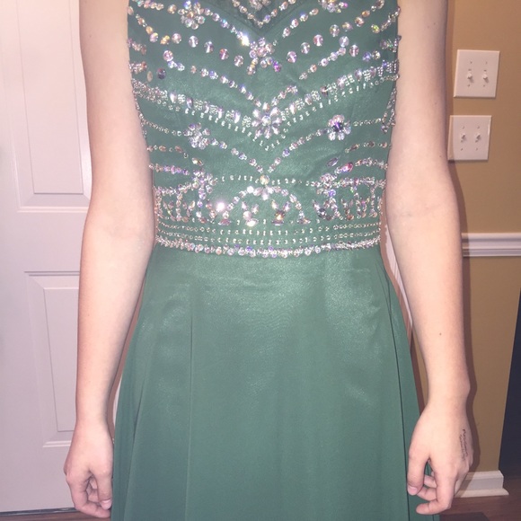 Emerald green jeweled prom dress