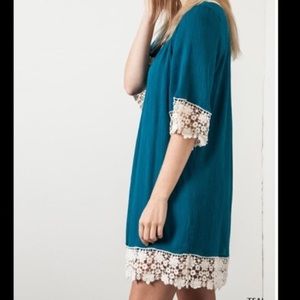 Teal dress with lace trim