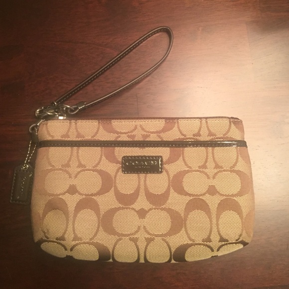 Authentic Coach wristlet.