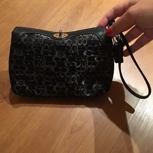 Coach wristlet with signature silver/black design