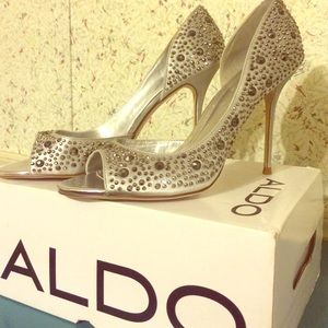 **ALDO** Silver Open toe pumps. (Brand new)