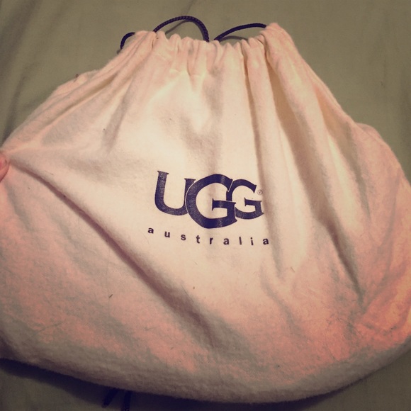 Never used tags still attached authentic UGG purse