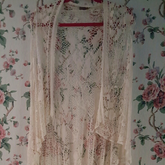 Long sleeveless knit cardigan