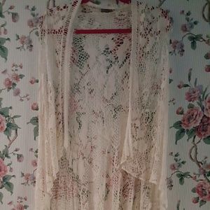 Long sleeveless knit cardigan