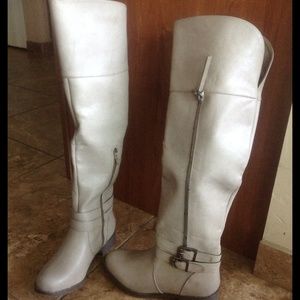 Beige knee high boots
