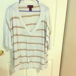 Tan and white striped to be in that sweater