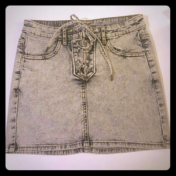Lace up mini denim skirt.