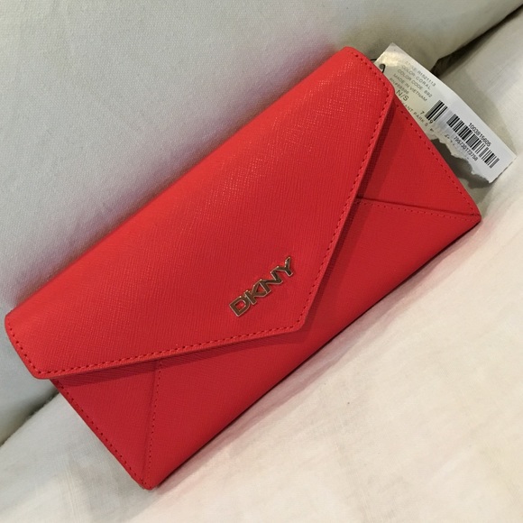 DKNY Handbags - DKNY wallet. NWT. Coral color.