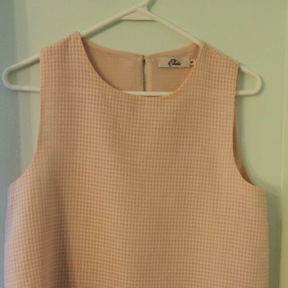 Pink sleeveless blouse