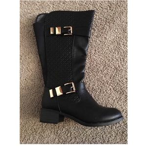 Black and gold boots